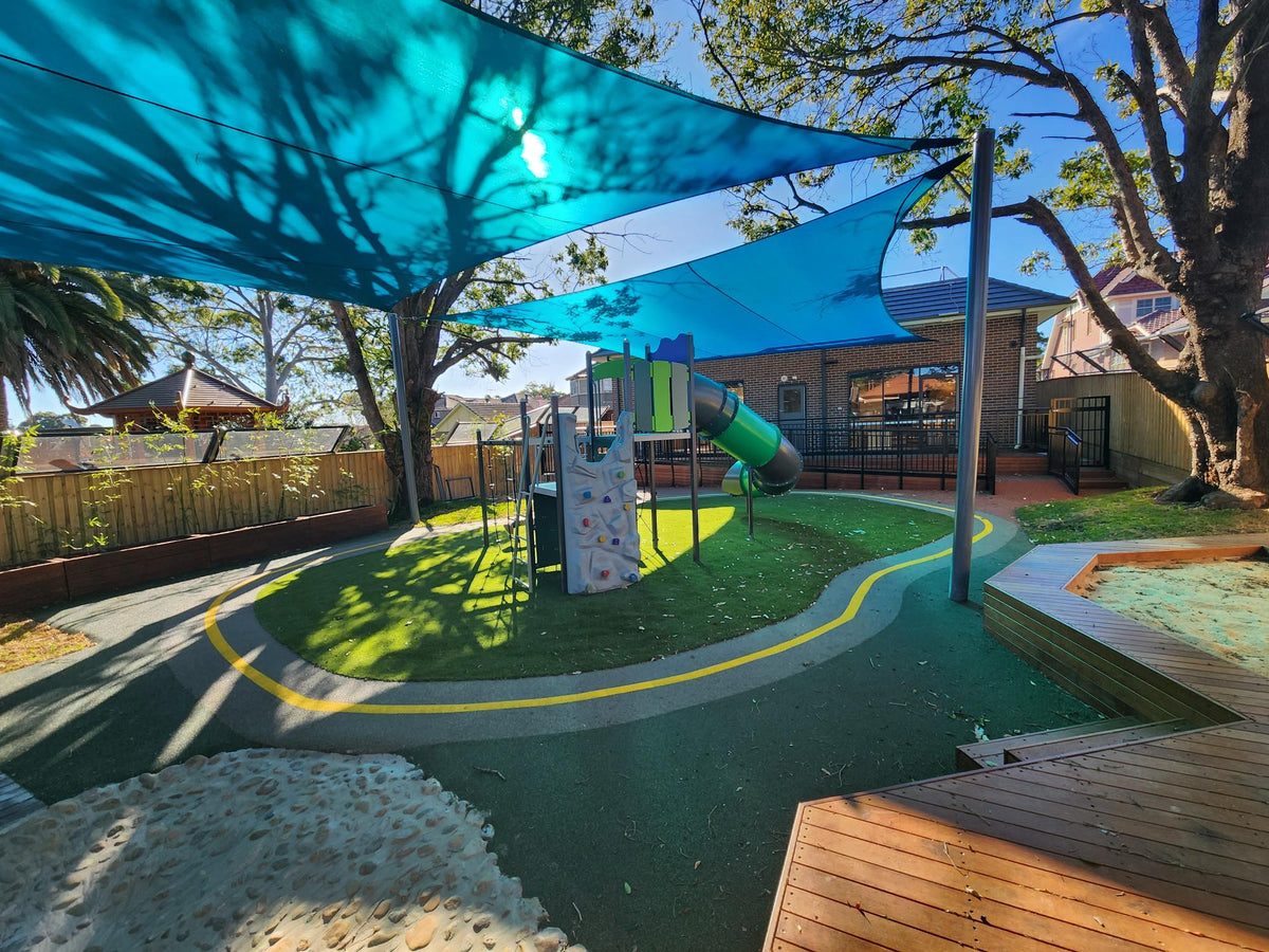 A childcare outdoor play space designed for summer
